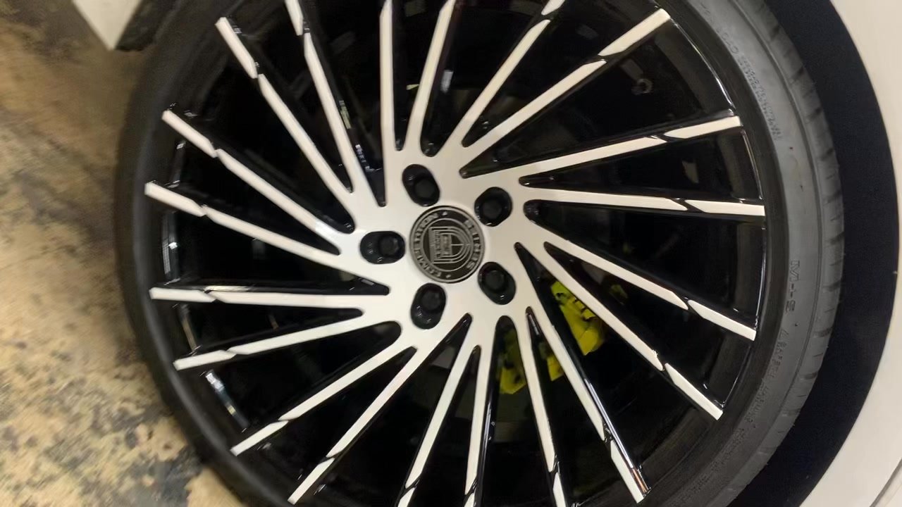 Black roof. White wheels.